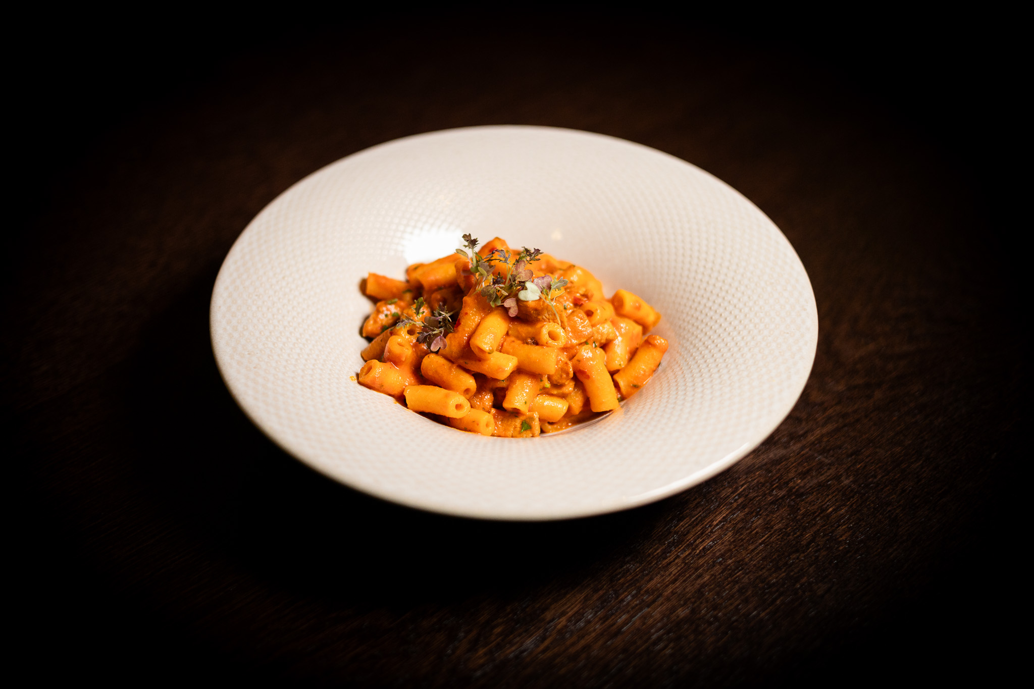 Rigatoni con filetto di maiale, salsa di crema di pomodoro con Nduja